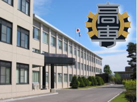 旭川高専校舎と校章